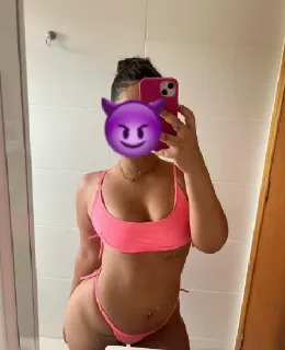 Latina escort with dark hair and brown eyes